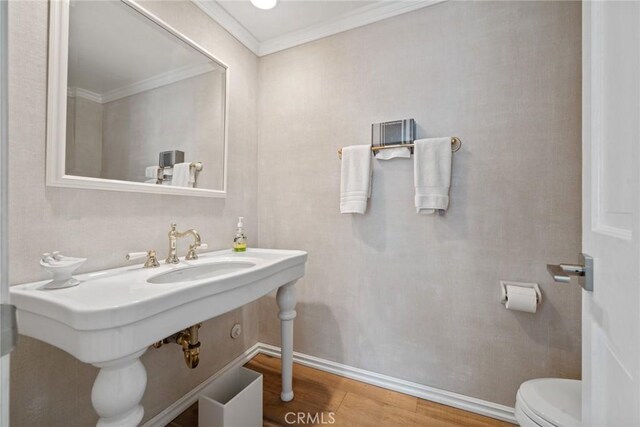 4420 Conchita Way, Tarzana, CA 91356 - bathroom with toilet, ornamental molding, wood finished floors, and baseboards