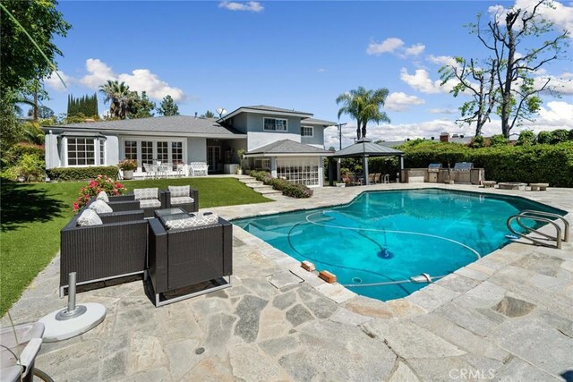 4420 Conchita Way, Tarzana, CA 91356 - view of swimming pool with a patio, a gazebo, outdoor lounge area, and a lawn