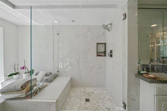 4420 Conchita Way, Tarzana, CA 91356 - bathroom featuring vanity, a marble finish shower, and recessed lighting