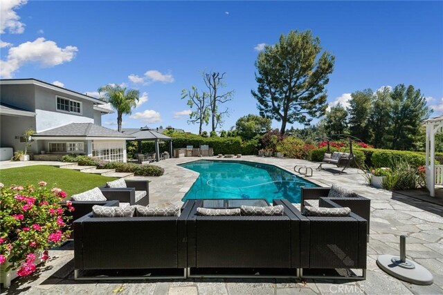 4420 Conchita Way, Tarzana, CA 91356 - outdoor pool featuring an outdoor living space, a gazebo, and a patio area
