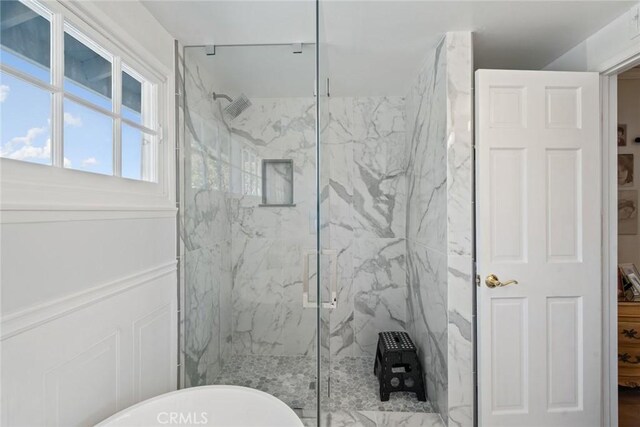 4420 Conchita Way, Tarzana, CA 91356 - ensuite bathroom featuring a marble finish shower and a freestanding bath