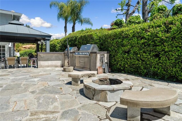 4420 Conchita Way, Tarzana, CA 91356 - view of patio / terrace featuring a fire pit and a gazebo
