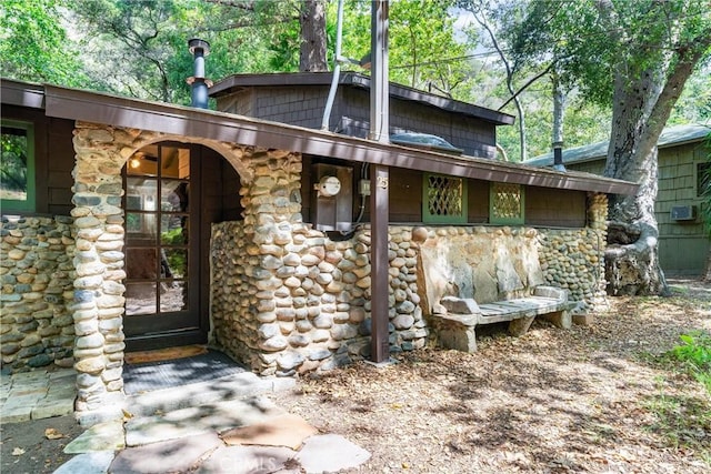 25 Hot Spring Canyon Rd, San Juan Capistrano, CA 92675 - view of exterior entry featuring stone siding