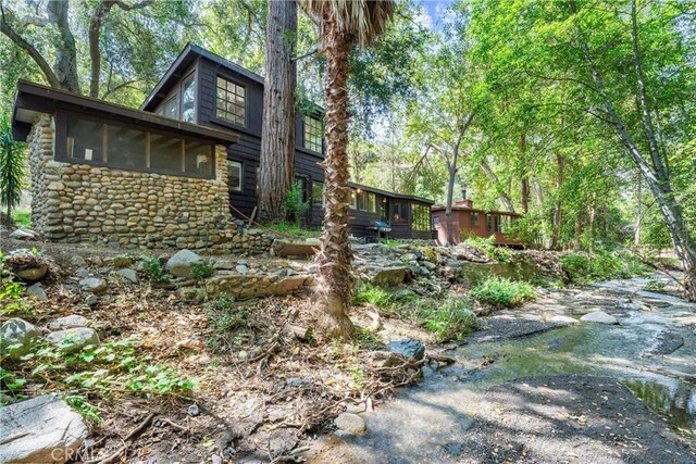 25 Hot Spring Canyon Rd, San Juan Capistrano, CA 92675 - view of home's exterior featuring stone siding