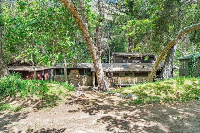 25 Hot Spring Canyon Rd, San Juan Capistrano, CA 92675 - view of front of house featuring a wooden deck and stone siding