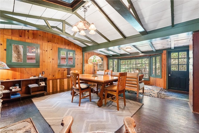 25 Hot Spring Canyon Rd, San Juan Capistrano, CA 92675 - dining room with wood walls, a chandelier, and wood finished floors