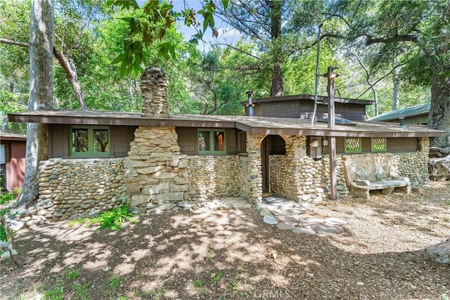 25 Hot Spring Canyon Rd, San Juan Capistrano, CA 92675 - view of front of home featuring stone siding