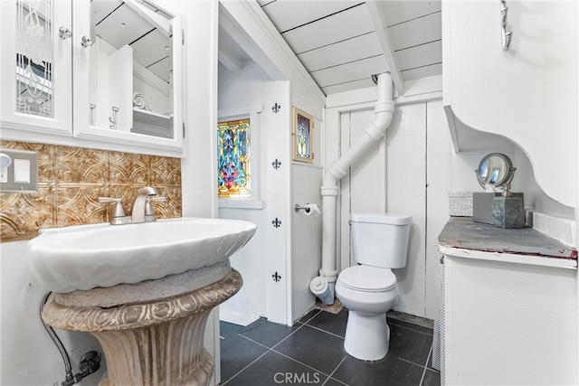 25 Hot Spring Canyon Rd, San Juan Capistrano, CA 92675 - half bathroom featuring toilet, tile patterned flooring, decorative backsplash, and beam ceiling