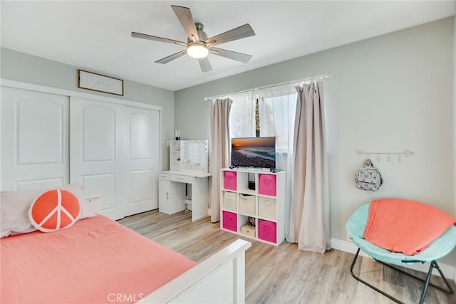 9463 Alder St, Rancho Cucamonga, CA 91730 - bedroom with light wood-style flooring, a closet, ceiling fan, and baseboards