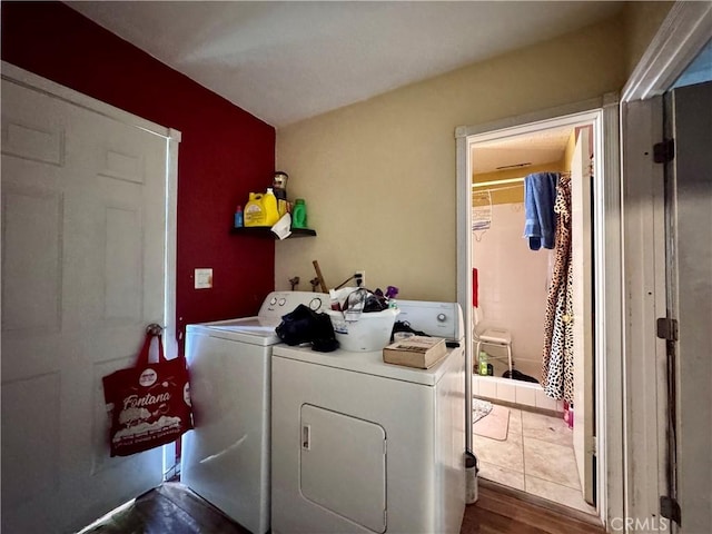 9547 Marion Ave, Montclair, CA 91763 - laundry area featuring washer and dryer and dark wood finished floors
