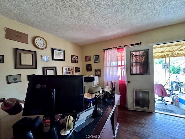 9547 Marion Ave, Montclair, CA 91763 - office space featuring dark wood-type flooring and a textured ceiling