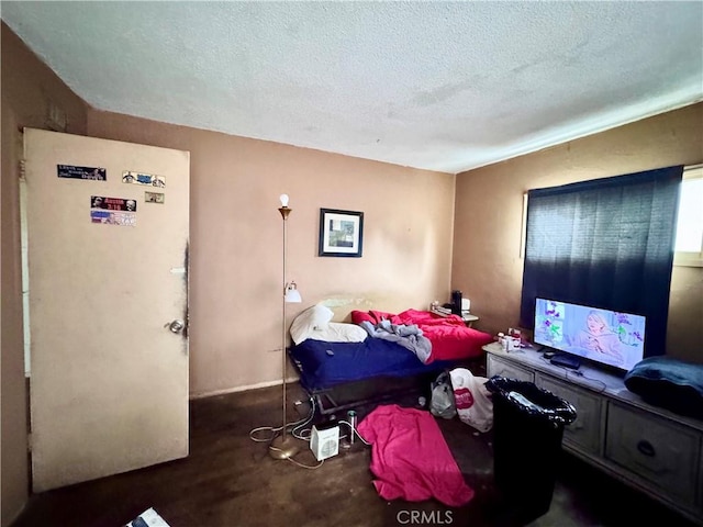 9547 Marion Ave, Montclair, CA 91763 - carpeted bedroom featuring a textured ceiling