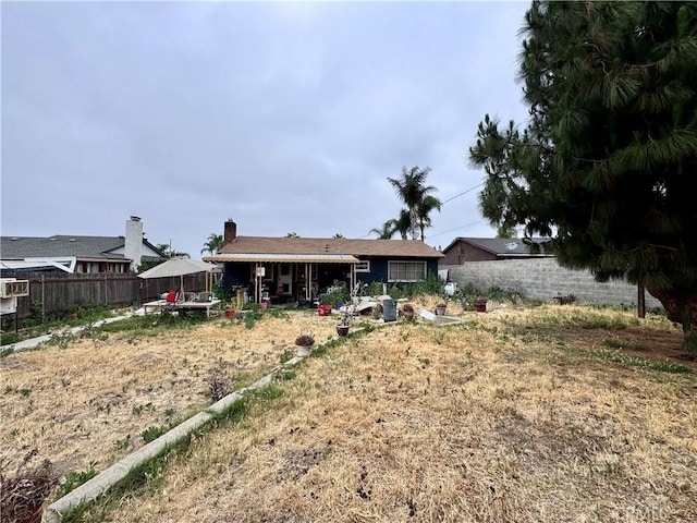 9547 Marion Ave, Montclair, CA 91763 - rear view of house with a chimney