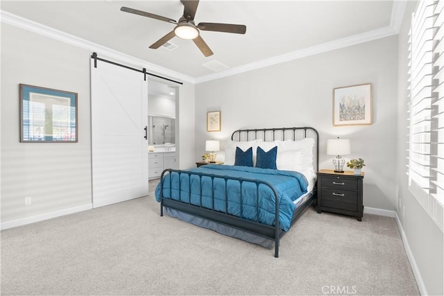 147 Luneta Ln, Rancho Mission Viejo, CA 92694 - bedroom featuring light colored carpet, a barn door, crown molding, baseboards, and ensuite bathroom