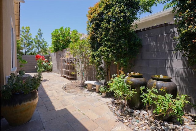 147 Luneta Ln, Rancho Mission Viejo, CA 92694 - fenced backyard featuring a patio area