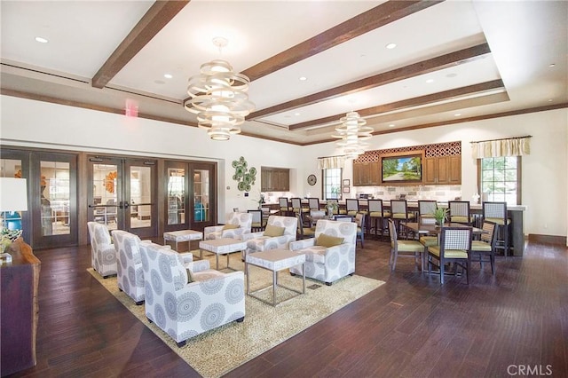147 Luneta Ln, Rancho Mission Viejo, CA 92694 - living room with french doors, beam ceiling, a chandelier, dark wood finished floors, and a tray ceiling
