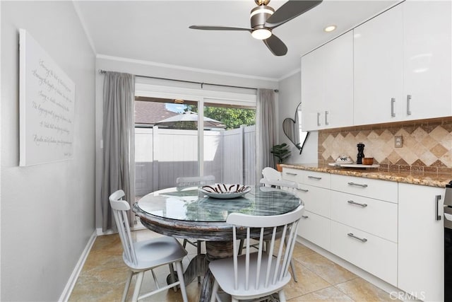 17861 Linda Dr Unit 12, Yorba Linda, CA 92886 - dining space featuring crown molding, ceiling fan, and baseboards
