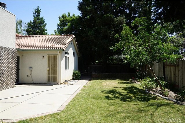 2068 Spy Glass Ct, Merced, CA 95340 - view of yard featuring a patio