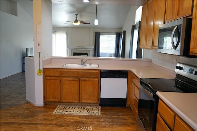 2068 Spy Glass Ct, Merced, CA 95340 - kitchen with range with electric cooktop, stainless steel microwave, white dishwasher, a sink, and a ceiling fan