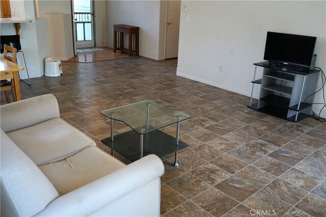 2068 Spy Glass Ct, Merced, CA 95340 - living area with stone finish flooring and baseboards
