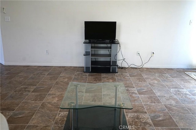 2068 Spy Glass Ct, Merced, CA 95340 - unfurnished living room featuring baseboards