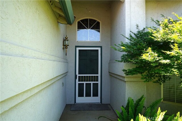 2068 Spy Glass Ct, Merced, CA 95340 - property entrance featuring stucco siding