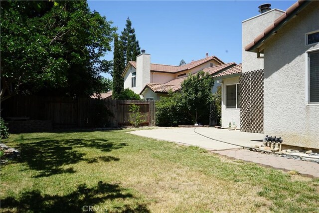 2068 Spy Glass Ct, Merced, CA 95340 - view of yard featuring a patio