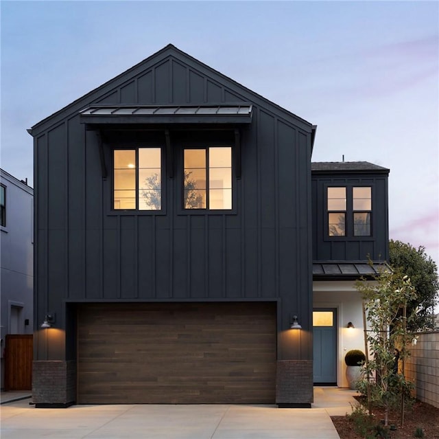 18017 Roch Ct, Fountain Valley, CA 92708 - modern farmhouse style home with board and batten siding, a garage, and concrete driveway