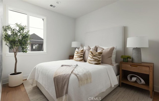 18017 Roch Ct, Fountain Valley, CA 92708 - bedroom featuring wood finished floors and baseboards