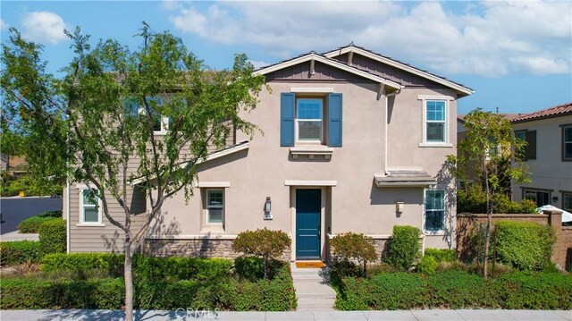 28 Fosco St, Rancho Mission Viejo, CA 92694 - view of front of property featuring stucco siding and stone siding