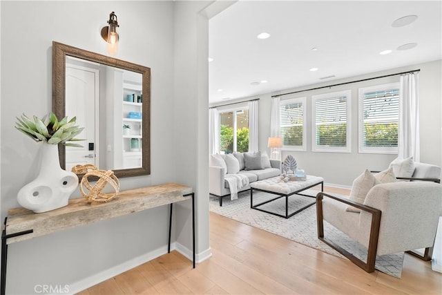 28 Fosco St, Rancho Mission Viejo, CA 92694 - living area featuring light wood-type flooring, baseboards, and recessed lighting