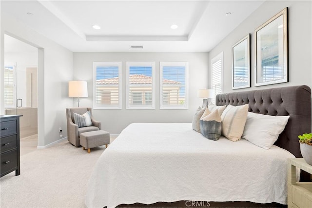 28 Fosco St, Rancho Mission Viejo, CA 92694 - bedroom featuring light carpet, a tray ceiling, ensuite bathroom, recessed lighting, and baseboards