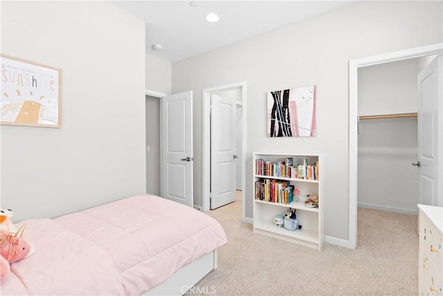 28 Fosco St, Rancho Mission Viejo, CA 92694 - bedroom featuring carpet flooring, a spacious closet, and baseboards