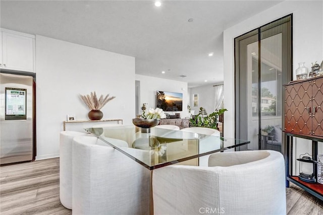 747 Spring Gdn, Irvine, CA 92618 - dining room featuring light wood-style floors, recessed lighting, and baseboards