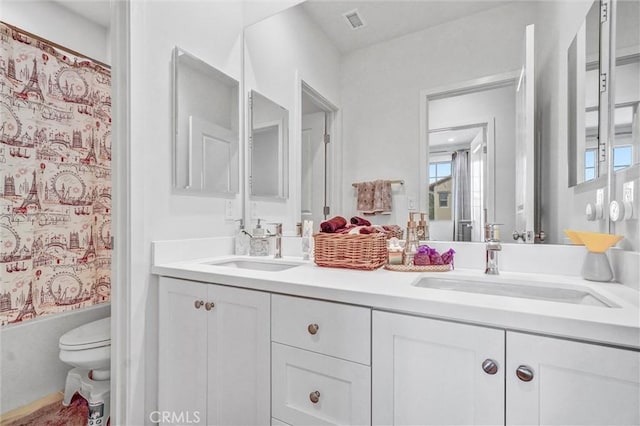 747 Spring Gdn, Irvine, CA 92618 - full bathroom with toilet, double vanity, and shower / bath combo with shower curtain