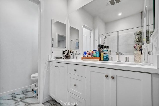 747 Spring Gdn, Irvine, CA 92618 - full bathroom featuring toilet, double vanity, marble finish flooring, a shower stall, and baseboards