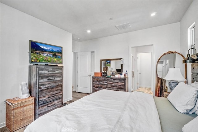 747 Spring Gdn, Irvine, CA 92618 - bedroom featuring baseboards, recessed lighting, and wood finished floors