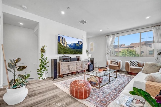 747 Spring Gdn, Irvine, CA 92618 - living room with wood finished floors, recessed lighting, and baseboards
