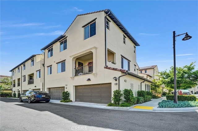 747 Spring Gdn, Irvine, CA 92618 - view of building exterior with a garage