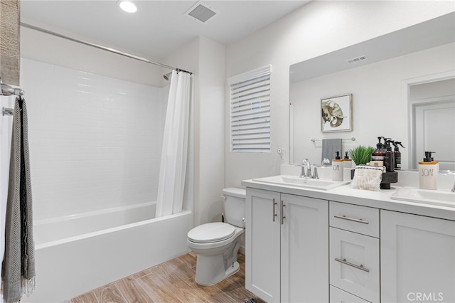 30893 Telegraph Dr, Winchester, CA 92596 - full bathroom with wood finished floors, double vanity, toilet, shower / bath combination with curtain, and recessed lighting