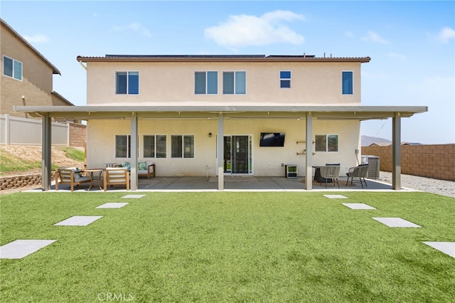 30893 Telegraph Dr, Winchester, CA 92596 - back of property with stucco siding, a patio, an outdoor hangout area, and central AC unit