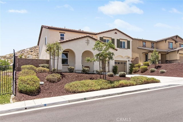 30893 Telegraph Dr, Winchester, CA 92596 - mediterranean / spanish-style house featuring stucco siding, a tile roof, and an attached garage