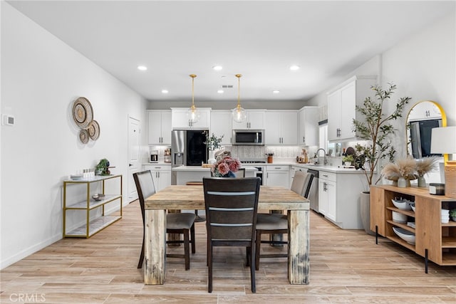 30893 Telegraph Dr, Winchester, CA 92596 - dining area featuring light wood-style flooring and recessed lighting