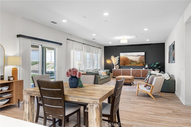 30893 Telegraph Dr, Winchester, CA 92596 - dining space with recessed lighting, light wood-style floors, an accent wall, and baseboards