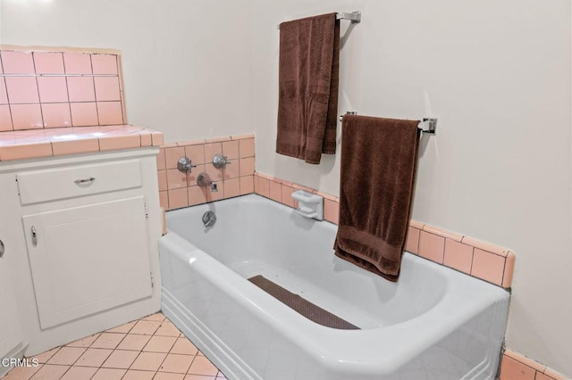 339 2nd St, Fillmore, CA 93015 - bathroom featuring a garden tub and tile patterned flooring