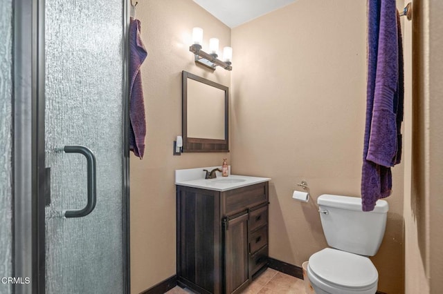 339 2nd St, Fillmore, CA 93015 - bathroom featuring toilet, vanity, baseboards, and tile patterned flooring