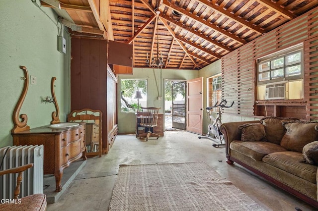 339 2nd St, Fillmore, CA 93015 - living room with radiator heating unit, unfinished concrete floors, plenty of natural light, lofted ceiling, and wooden ceiling