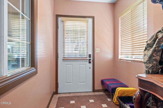 339 2nd St, Fillmore, CA 93015 - doorway to outside featuring baseboards and tile patterned flooring
