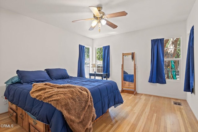 339 2nd St, Fillmore, CA 93015 - bedroom with multiple windows, light wood-type flooring, and a ceiling fan