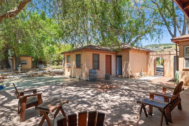 339 2nd St, Fillmore, CA 93015 - view of patio featuring an outbuilding